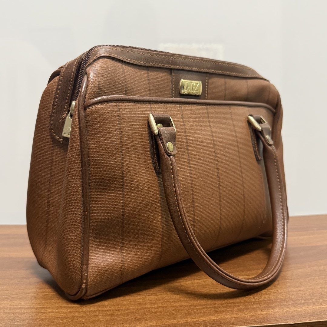Vintage Brown Satchel Handbag (Category: Luxury Bags & Wallets) located in Baliuag. Submitted by from.linea (Listing ID 1458133909, Image 3). Description: Vintage Brown Satchel Bag Price: ₱1,200 Brand: Liz Claiborne RFS: Decluttering (personal preloved bags, not bought from ukay) Location: Baliuag, Bulacan Pickup/Meet-up: Around Baliuag Delivery Options: SPX | Lalamove (Delivery fee will be shouldered by the buyer) Additional Notes: Feel free to 