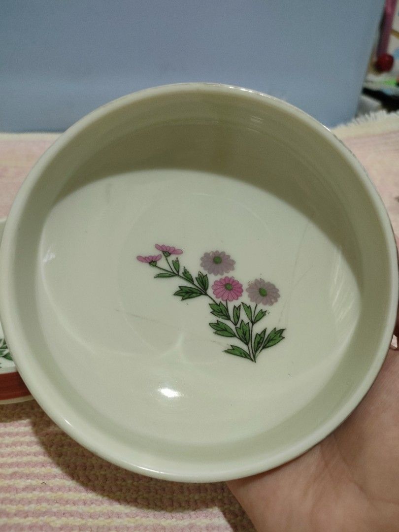 Vintage Floral Ceramic Bowl Set (Category: Other Kitchenware & Tableware) located in Bulacan. Submitted by hunterherojapanjdm (Listing ID 1458161173, Image 3). Description: - Set of two small ceramic bowls - Features delicate pink and purple floral design - Red trim around the rim - Ideal for snacks or small dishes - Approximately 10cm in diameter.