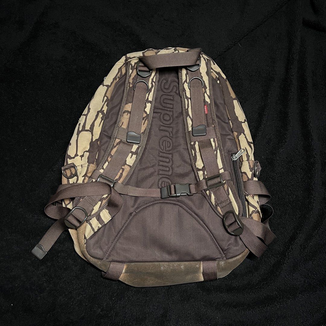 Vintage Supreme F/W 06 Treebark Camo Backpack (Category: Backpacks) located in Marikina City. Submitted by wayupcollective (Listing ID 1458236248, Image 2). Description: Vintage Supreme F/W 06 Treebark Camo Backpack This is a vintage piece Still in good condition 4 compartments Big YKK zippers No major flaws Only flaw: expired garter inside (laptop compartment) Measurement Length: 16” Width: 13” Depth: 5” .