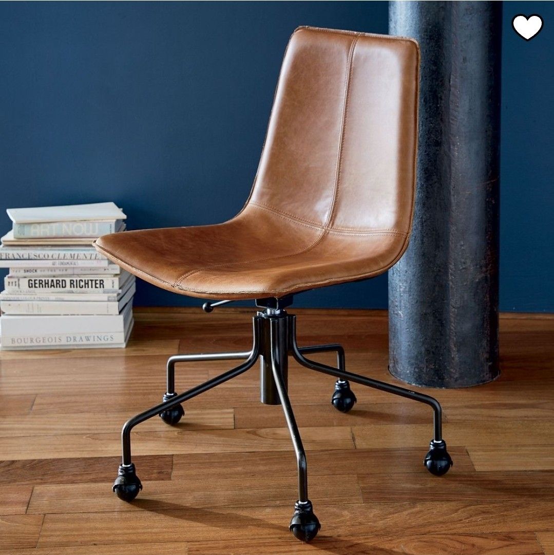 West Elm Swivel Chair (Category: Office Furniture & Fixtures) located in Makati City. Submitted by catfs (Listing ID 1458099129, Image 1). Description: - Comfortable brown leather office chair - Sturdy black metal base with smooth-rolling wheels - Swivels for easy movement - Adjustable height for personalized comfort - Stylish and functional for any home office or desk setup - Dimensions available in photos -.