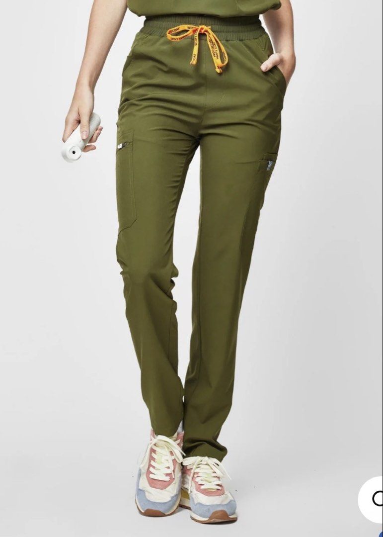 White coat manila Scrub Top & Pants movetech - Forest Green (Category: Activewear) located in Davao. Submitted by camillefongty (Listing ID 1458222578, Image 2). Description: - White Coat Manila Movetech - V-neck top small size - Tapered pants small size - Multiple zip pockets on pants for secure storage - Comfortable and functional for everyday wear - Perfect for healthcare professionals or anyone needing durable workwear.