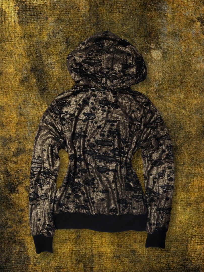 Y2k Distressed Metallic Hoodie (Category: Coats, Jackets and Outerwear) located in Talisay. Submitted by axl_enver (Listing ID 1458214019, Image 3). Description: Metallic bronze-gold sheen, burnout knit with see-through distressed holes Size: Women's S–M W 17.5" L 22" Sleeve 23.5".