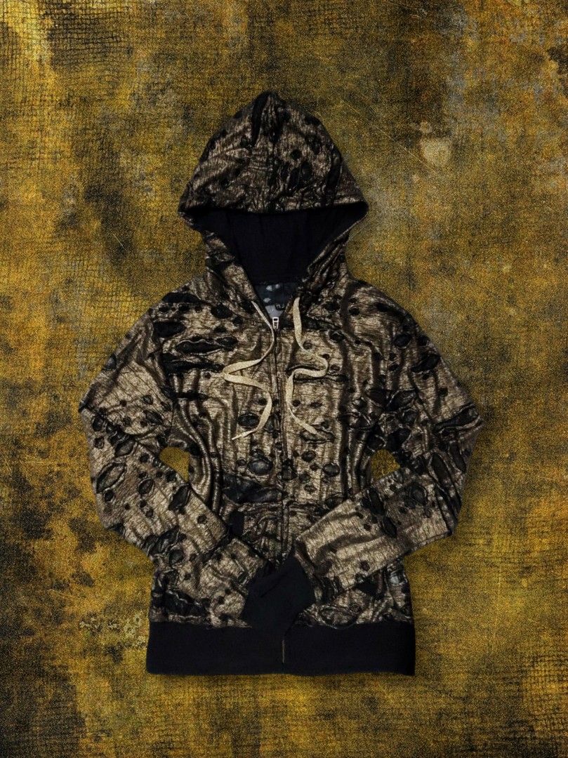 Y2k Distressed Metallic Hoodie (Category: Coats, Jackets and Outerwear) located in Talisay. Submitted by axl_enver (Listing ID 1458214019, Image 1). Description: Metallic bronze-gold sheen, burnout knit with see-through distressed holes Size: Women's S–M W 17.5" L 22" Sleeve 23.5".