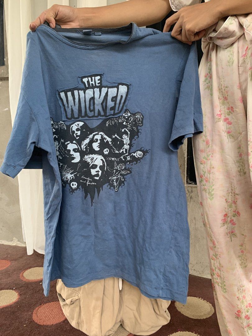 Y2K grunge (Category: Tshirts & Polo Shirts ) located in Salug. Submitted by nasramos (Listing ID 1458219678, Image 1). Description: Super sick Jack & Jones “The Wicked” graphic t-shirt in a faded slate blue colorway. This piece features a heavy alternative aesthetic with raw-edge patch overlays on the front graphic, a spiderweb patch on the back neck, and a decorative stitch frame near the bottom hem. Perfect for grunge, Y2K alternative, mall go