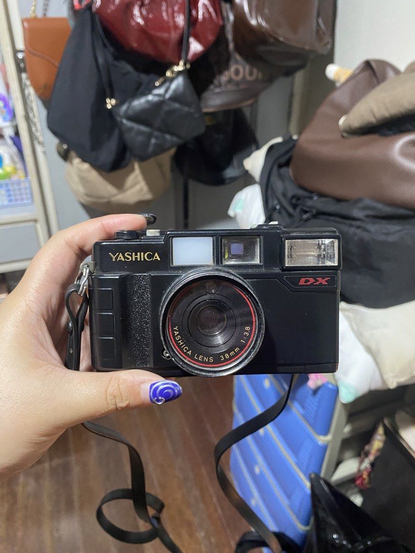 Yashica MF2 Super Film Camera (Category: Cameras) located in Manila. Submitted by yamskei04 (Listing ID 1458122146, Image 1). Description: - The Yashica MF-2 Super DX is a compact, fixed-focus 35mm film point-and-shoot camera featuring a 38mm f/3.8 lens and automatic DX-coding for ISO 100 to 400 films.Technical Specifications Format: 35mm filmLens: 38mm, f/3.8 (3 elements in 3 groups)Focus Range: Fixed focus from 1.5 meters (5 feet) to infinity S