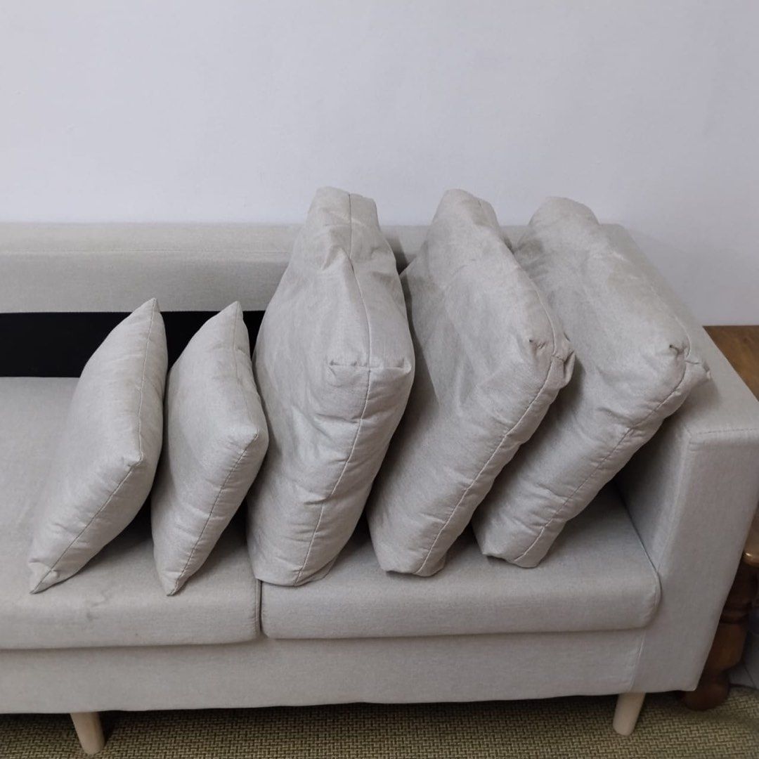 SOFA (Category: Sofas) located in Shah Alam. Submitted by meerame (Listing ID 1458461572, Image 1). Description: - Comfortable 3-seater sofa - Includes 5 cushions - Upholstered in breathable cotton and linen fabric - Sturdy solid wood frame and legs - Dimensions: 170cm (L) x 60cm (W) x 56cm (H) - Seat height: 40cm - Seat depth: 15cm - High resilience sponge for a comfortable sit - Pillow included SELF PICK UP ONLY.