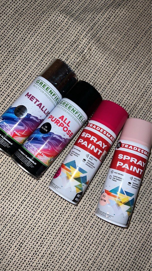 4 cans of Spray Paint (Category: Craft Supplies & Tools) located in Pasig City. Submitted by shop.prelovedbycza (Listing ID 1458421777, Image 2). Description: -Brand: Greenfield, Shade: 39 Black, 10% used -Brand: Greenfield, Shade: Bright Chrome (Silver), 20% used -Brand: Tradesman, Shade: 2012 Fluorescent Fuchsia Pink, 35% used -Brand: Tradesman, Shade: 313 Light Pink, 30% used -Location: Pasay City -Shipping must be shouldered by buyer.