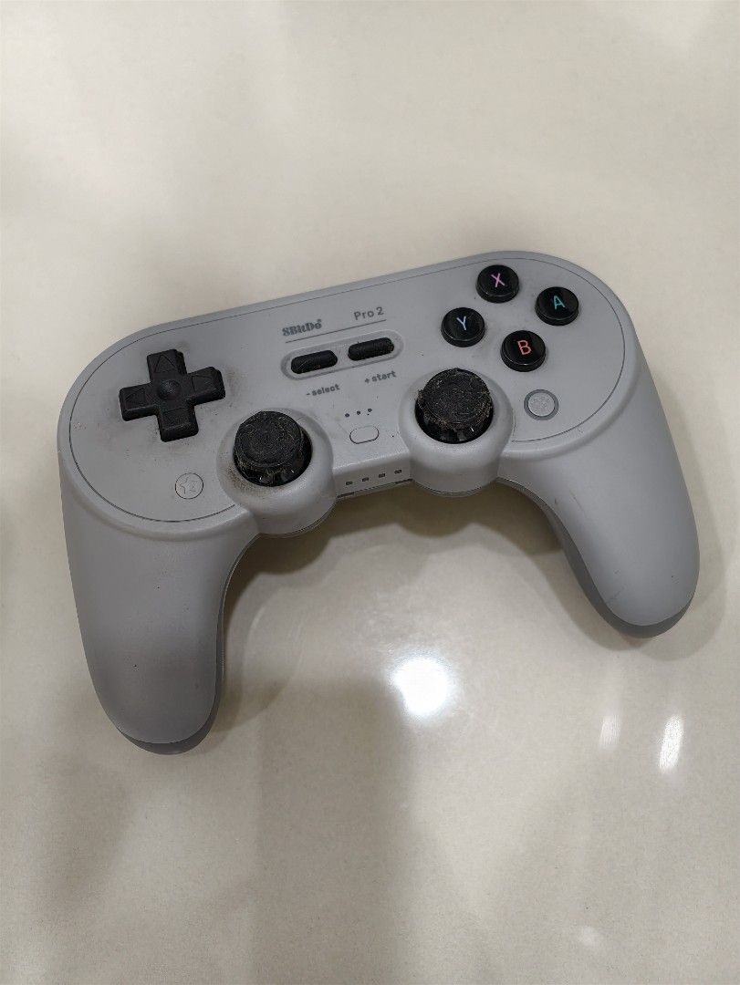 8BitDo Pro 2 Game Controller (Category: Controllers) located in Cheras. Submitted by zengem.76a5d4 (Listing ID 1458322732, Image 1). Description: - 8BitDo Pro 2 Controller (Grey) - Analog sticks show some wear, but fully functional - Excellent for retro and modern gaming - Supports both wireless and wired connections.