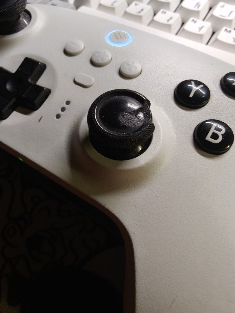 8BitDo Ultimate Bluetooth Controller White (Category: Controllers) located in Gombak. Submitted by milo4is (Listing ID 1458478697, Image 2). Description: - White 8BitDo ultimate bluetooth Controller - Minor cosmetic wear on right joystick (as pictured) - Fully functional and works great - Body is well taken care - Selling because upgrading - Missing USB cable.
