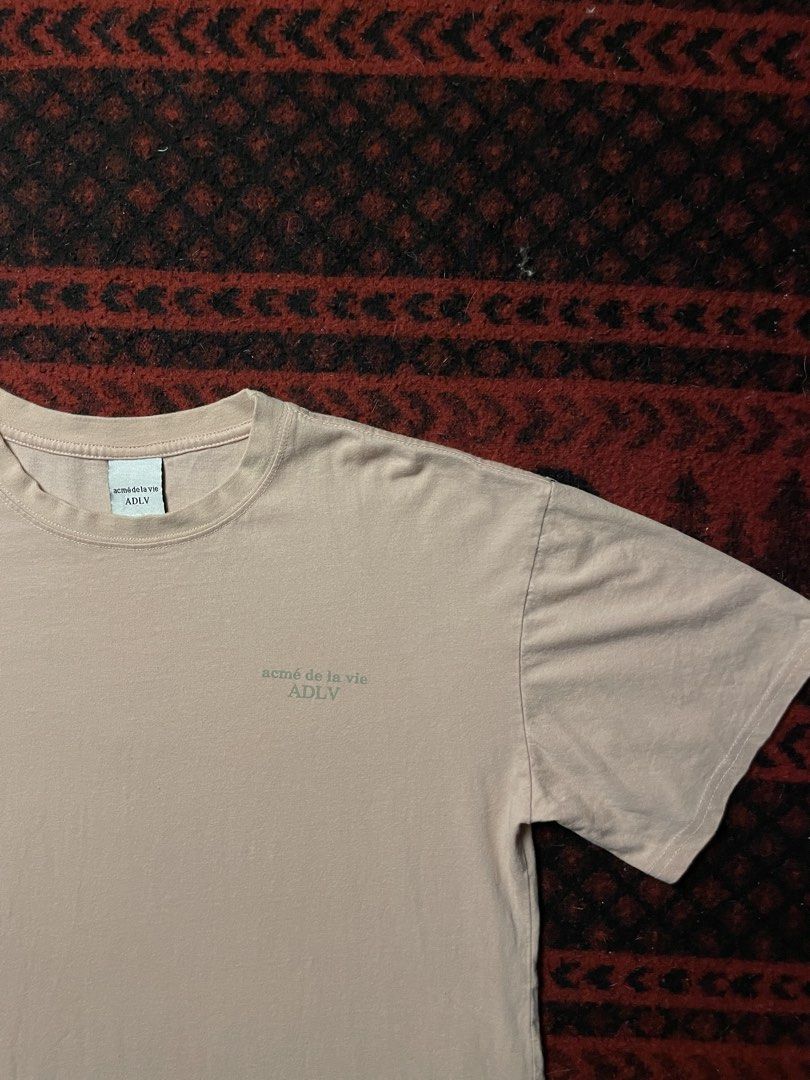 Acme De La Vie Basic Logo Short Sleeve Shirt (Category: Tshirts & Polo Shirts ) located in Caloocan City. Submitted by piecesgarments (Listing ID 1458311644, Image 2). Description: ADLV | Basic Short Sleeve Logo Tshirt (Next photos for detailed pictures and when worn) Size:Small-Medium Cropped Width:22" Length:24" Material Quality:Cotton Issue:None Condition:Good As New Model:5’7 Price:₱399 📝Reminder: All items are thrifted.Expect the condition 