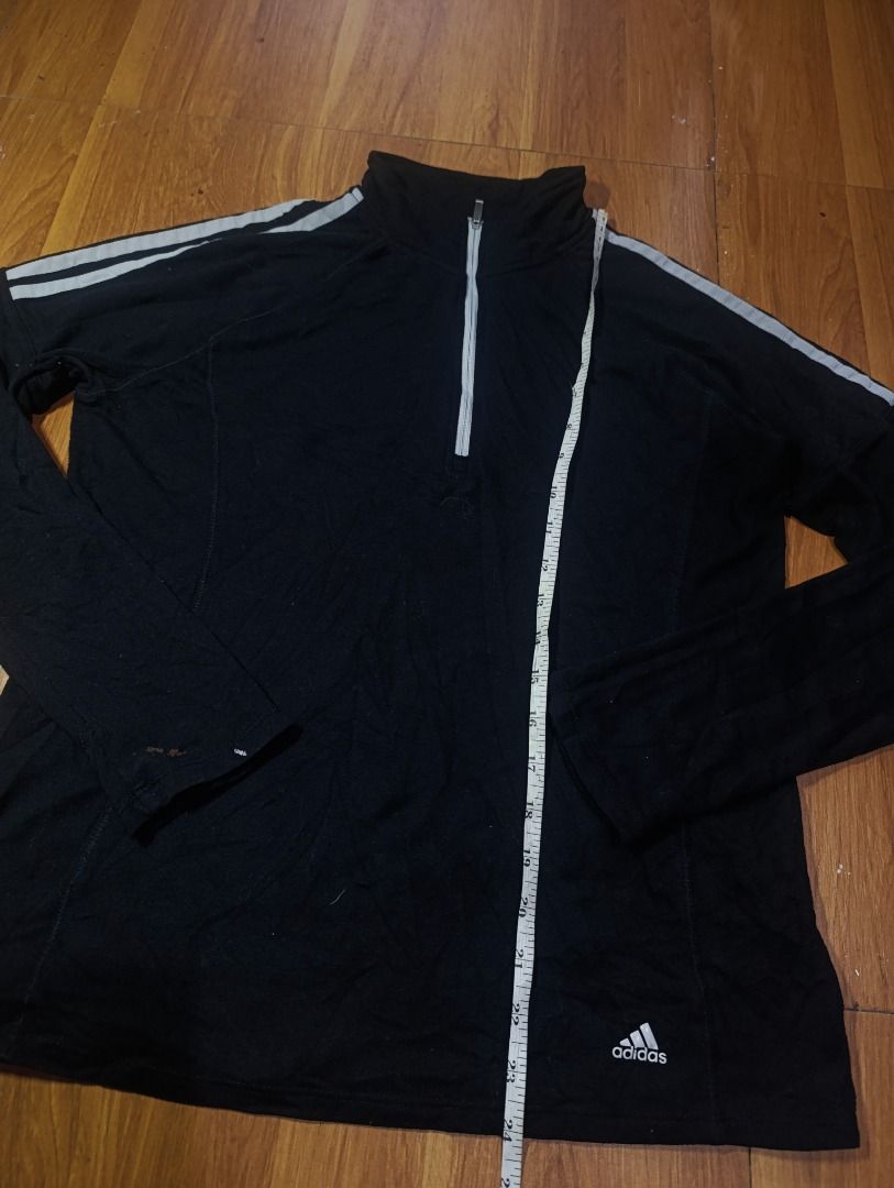 Adidas Pull over Golf 1/2 Zip Longsleeve (Category: Coats, Jackets and Outerwear) located in Bulacan. Submitted by koritoo (Listing ID 1458378983, Image 3). Description: Adidas Pull over Golf 1/2 Zip Longsleeve Good condition, paint issue Size M Dimensions: 19 Width 24 Length Color rate: 10/10.
