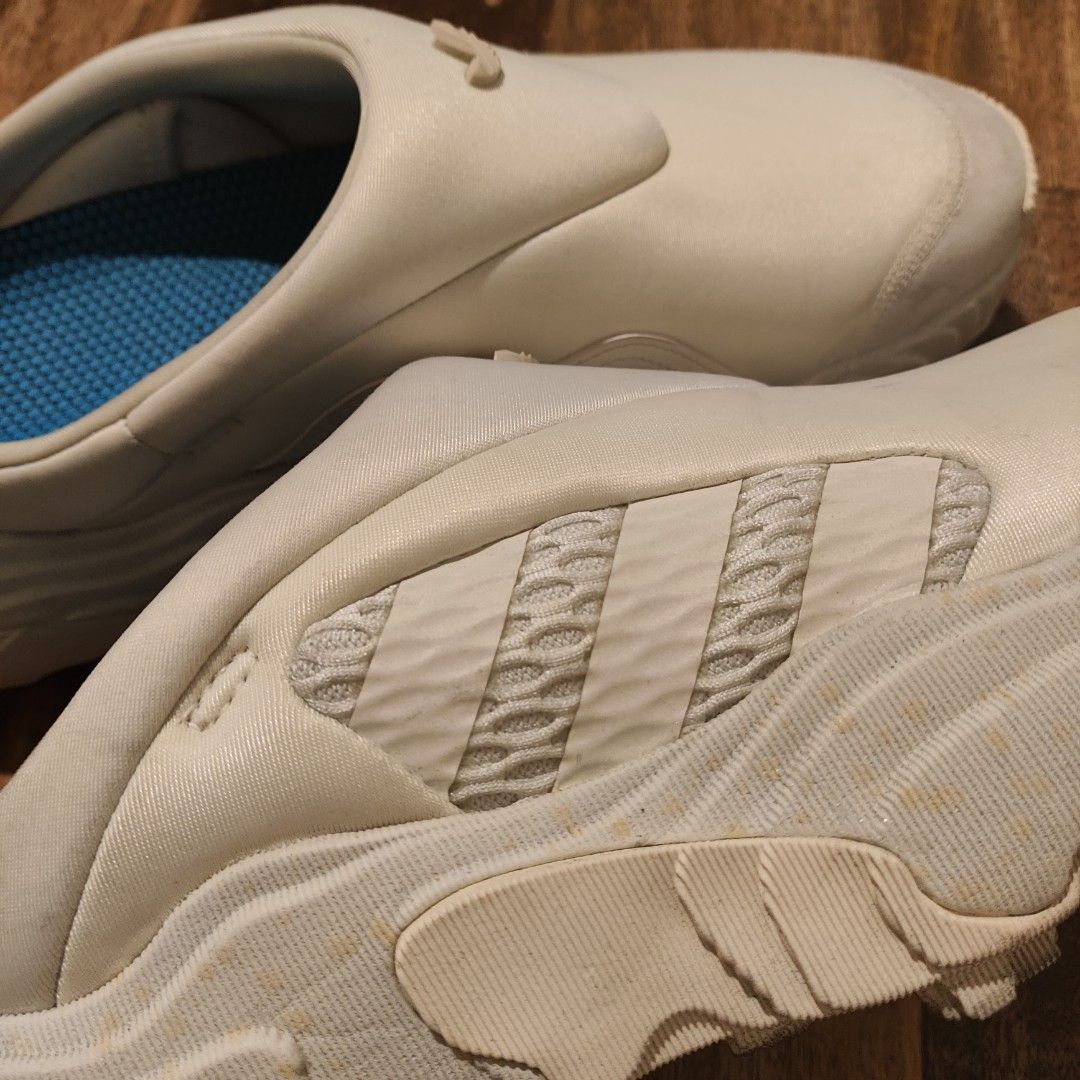 Adidas Rovermule US9.5 Mens (Category: Slippers & Slides) located in Taguig. Submitted by panicxitsxjim (Listing ID 1458316147, Image 2). Description: - White Adidas clogs - Easy slip-on style - Classic Adidas stripes on the side - Comfortable blue insole - Ideal for casual wear or around the house.