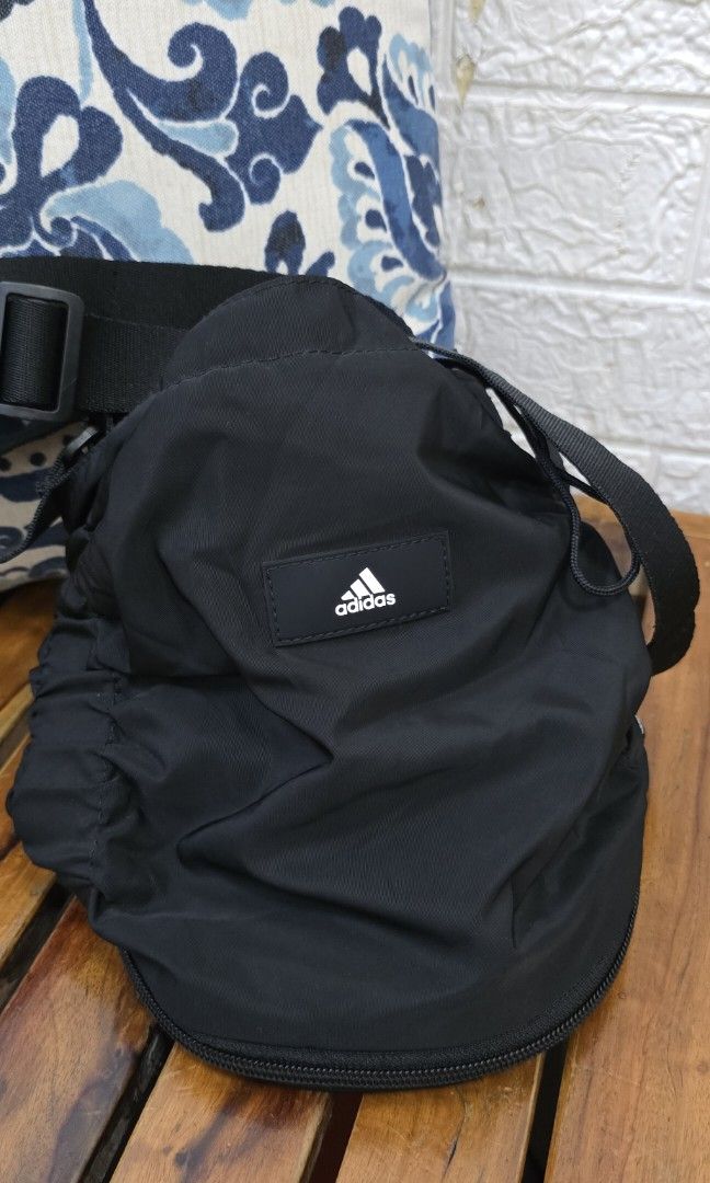 Adidas yoga convertible drawstring bag (Category: Shoulder Bags) located in Manila. Submitted by loved_collections (Listing ID 1458438454, Image 2). Description: like new! no fades super black pa in actual adjustable sling strap- can be worn crossbody or shoulder bag. semi-medium size- fit-in water bottle SALE!.