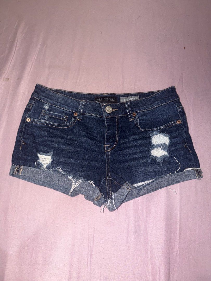 Aeropostale Distressed Denim Shorts (Category: Shorts) located in Manila. Submitted by maureenn10 (Listing ID 1458424965, Image 1). Description: - Aeropostale dark wash denim shorts - Distressed look with rips and frayed hems - Cuffed at the bottom - Ideal for casual wear - Versatile for styling with any top.