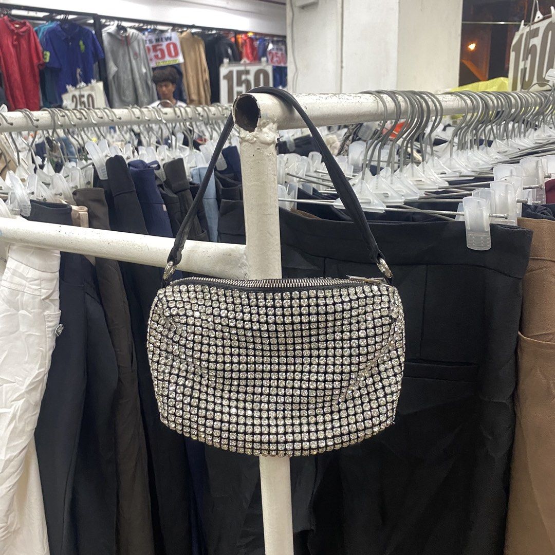 Alexander Wang Rhinestone Shoulder Bag (Category: Luxury Bags & Wallets) located in Zamboanga. Submitted by thriftyyali (Listing ID 1458488573, Image 1). Description: - Sparkly Alexander Wang shoulder bag - Covered in rhinestones all over - Black leather strap with embossed logo - Zipper closure - Interior zippered pocket - Ideal for nights out or adding glam - Approximate measurements: 9 inches wide x 5 inches tall.