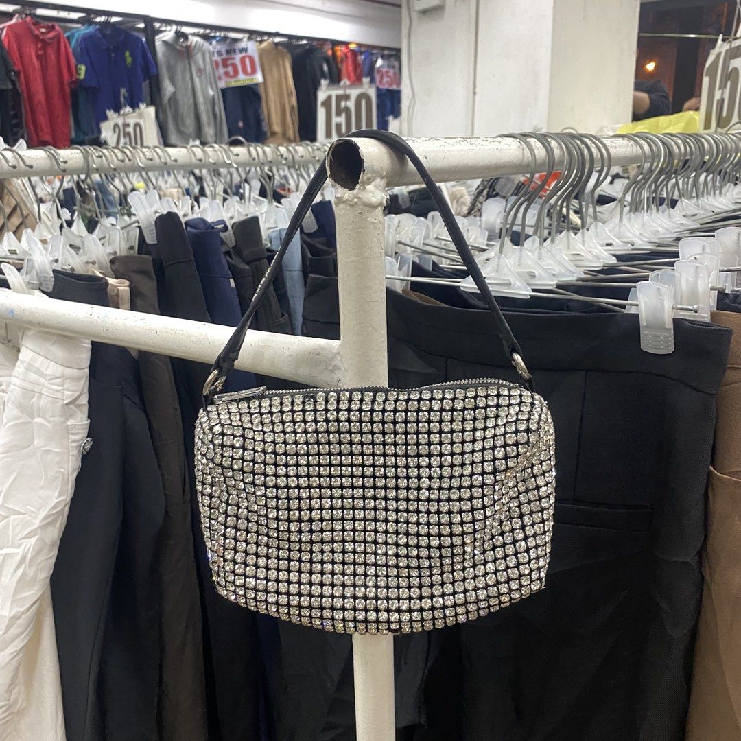 Alexander Wang Rhinestone Shoulder Bag (Category: Luxury Bags & Wallets) located in Zamboanga. Submitted by thriftyyali (Listing ID 1458488573, Image 2). Description: - Sparkly Alexander Wang shoulder bag - Covered in rhinestones all over - Black leather strap with embossed logo - Zipper closure - Interior zippered pocket - Ideal for nights out or adding glam - Approximate measurements: 9 inches wide x 5 inches tall.