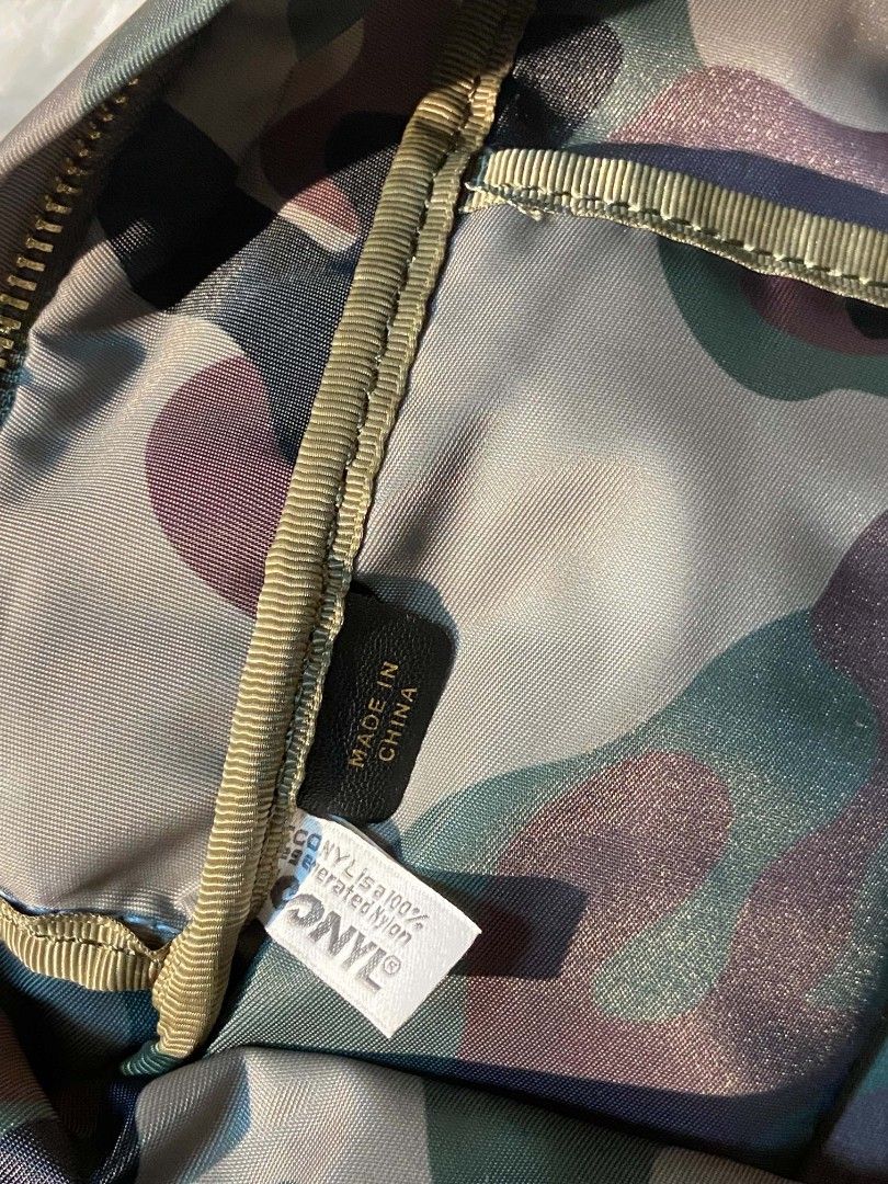 Anya Hindmarch Camouflage Eyes Backpack (Category: Babies & Kids Fashion) located in Bulacan. Submitted by bella.ken.varietystore (Listing ID 1458339167, Image 3). Description: Cute Anya Hindmarch backpack. Features a fun camouflage print with googly eyes on the front pocket. Made from 100% recycled nylon. Plenty of space inside with pockets for organization. Great for everyday use or travel..
