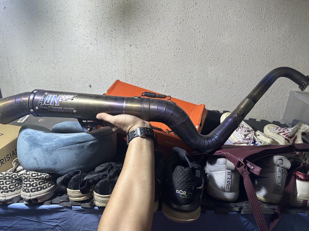 AUN Thailand Motorcycle Exhaust Pipe (Category: Construction & Building Materials) located in Quezon City. Submitted by apollo0624 (Listing ID 1458440979, Image 1). Description: - Genuine AUN Thailand exhaust pipe - Performance upgrade for your motorcycle - Striking iridescent finish - Ready for a new owner.