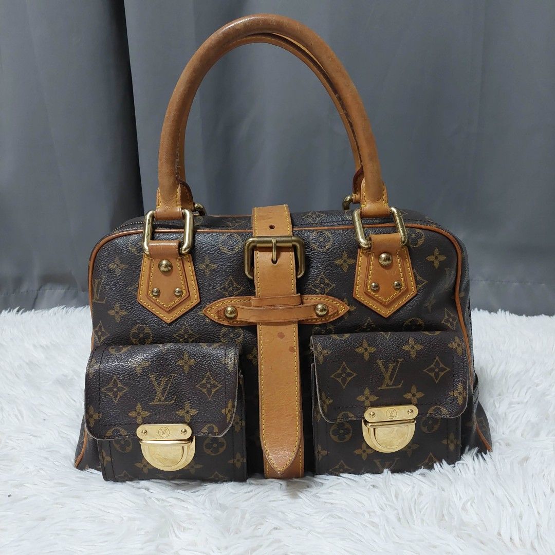 AUTHENTIC LOUIS VUITTON MANHATTAN GM (Category: Luxury Bags & Wallets) located in Antipolo. Submitted by lyannas_closet (Listing ID 1458447958, Image 1). Description: FOR SALE | AUTHENTIC LOUIS VUITTON MANHATTAN GM Letting go of a very special piece from my personal collection. 🤎 I personally bought this Louis Vuitton Manhattan GM from a pawnshop in Japan about 18 years ago. It has been with me for many years, so this one is definitely a sentime