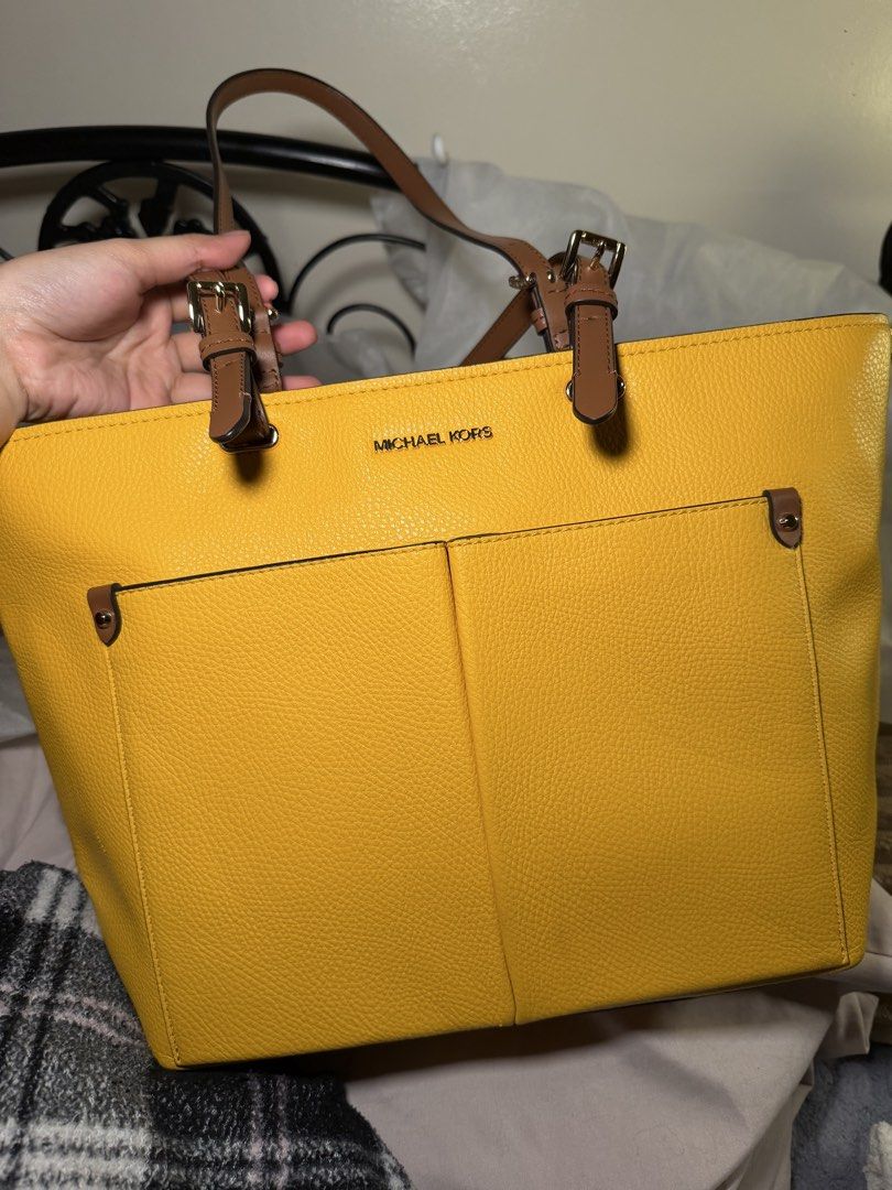 AUTHENTIC Michael Kors Jet Set Travel Medium Double Pocket Tote (Category: Tote Bags) located in Quezon City. Submitted by nakii_ko (Listing ID 1458376630, Image 2). Description: ‼️CHECK LAST IMAGE FOR FLAW Complete with its own pouch and care card GUARANTEED AUTHENTIC LBC or LALAMOVE.