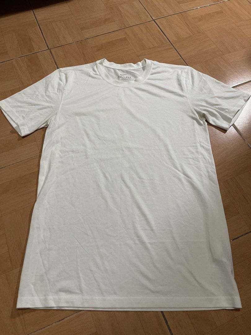 AUTHENTIC NIKE DRI-FIT SHIRT (WHITE) (Category: Tshirts & Polo Shirts ) located in Bauang. Submitted by doc_jay01 (Listing ID 1458443849, Image 1). Description: ORIGINAL/AUTHENTIC PRELOVED LENGTH: 27 inches CHEST: 32-36 inches PRICE: 299 J&T/LBC AT BUYER’S EXPENSE LBC COD AVAILABLE (DP 50%) PM FOR MORE DETAILS .