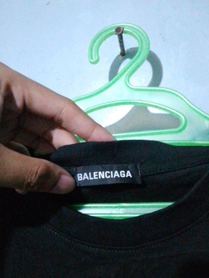 Balenciaga Logo Shirt (Category: Tshirts & Polo Shirts ) located in Navotas City. Submitted by _ryujin (Listing ID 1458319861, Image 3). Description: Dimensions Width - 21 Length -27 No issue excellent condition - Balenciaga Logo Tee - Color: Black - Size: XS - Iconic wavy logo print on front and back - Made in Portugal - Please check photos for detailed condition. Dm if you're interested thank you!.