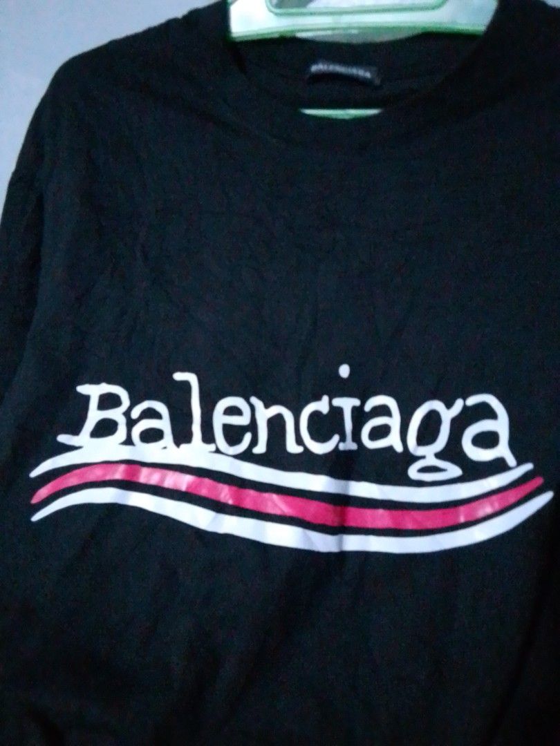 Balenciaga Logo Shirt (Category: Tshirts & Polo Shirts ) located in Navotas City. Submitted by _ryujin (Listing ID 1458319861, Image 2). Description: Dimensions Width - 21 Length -27 No issue excellent condition - Balenciaga Logo Tee - Color: Black - Size: XS - Iconic wavy logo print on front and back - Made in Portugal - Please check photos for detailed condition. Dm if you're interested thank you!.