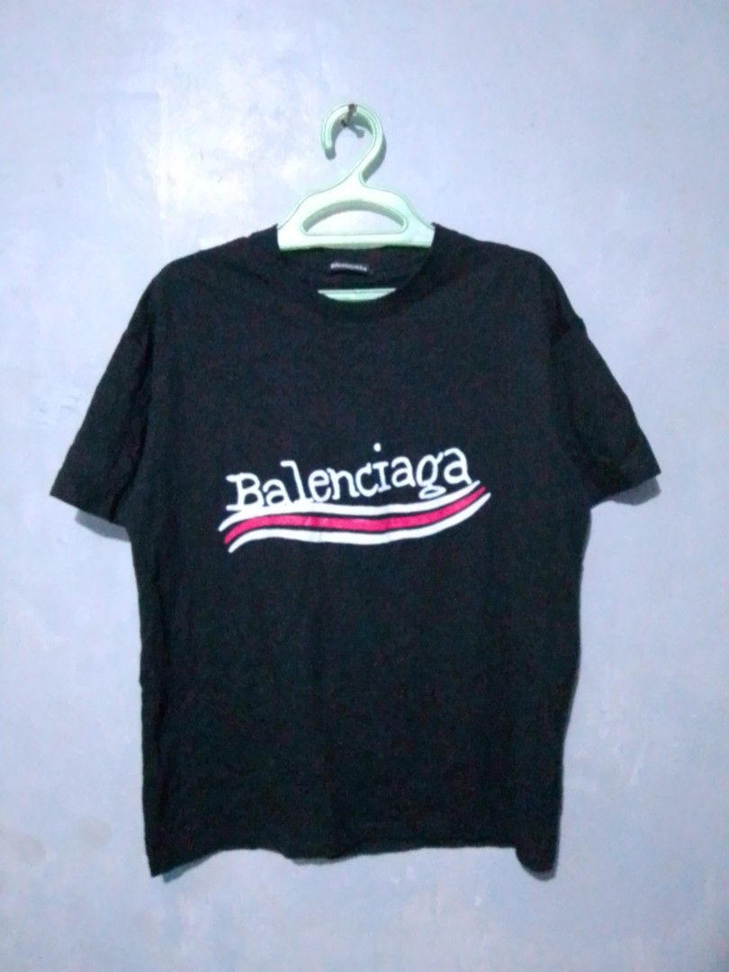 Balenciaga Logo Shirt (Category: Tshirts & Polo Shirts ) located in Navotas City. Submitted by _ryujin (Listing ID 1458319861, Image 1). Description: Dimensions Width - 21 Length -27 No issue excellent condition - Balenciaga Logo Tee - Color: Black - Size: XS - Iconic wavy logo print on front and back - Made in Portugal - Please check photos for detailed condition. Dm if you're interested thank you!.