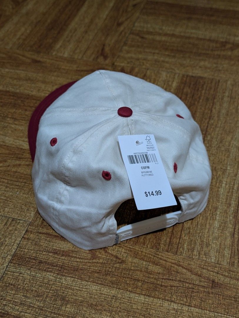 Bass Pro Shops Chenille Rope Cap (Category: Caps & Hats) located in Quezon City. Submitted by aivan_sison (Listing ID 1458449133, Image 2). Description: - White and red Bass Pro Shops cap - Features 'Bass Pro Shops EST. USA 1972' embroidery on the front - Rope detail above the brim - Adjustable strap at the back for a custom fit - Ideal for fishing trips or everyday casual wear - Issue: Minor fabric rip (see last picture).