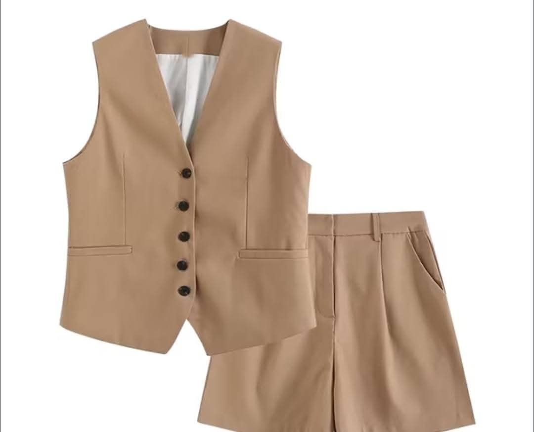 Beige coordinates (Category: Sets or Coordinates) located in Tuguegarao City. Submitted by bili_naph (Listing ID 1458398608, Image 2). Description: ☆ Beige two-piece vest and shorts coordinates ☆ Bought in Bangkok for P1,950 ☆ Brand new but no tag ☆ Size large ☆ Bust 37" ☆ Waist 30" (garterized, can fit until 32") ☆ Length 17.2" ☆ Very pretty! 😍 ☆ P800.00 only.