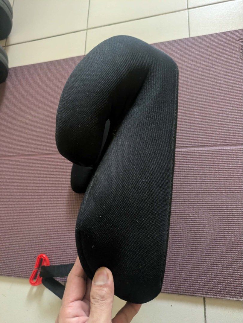 Black Car Seat Booster with Strap (Category: Car Seats) located in Quezon City. Submitted by jessiemarketplace (Listing ID 1458323848, Image 3). Description: - Black car seat booster for child safety. - Features a secure strap with a red clip. - Padded sides offer extra comfort during rides. - Durable hard plastic base for stability. - Simple and easy installation process. - Ensures a safe journey for your child..