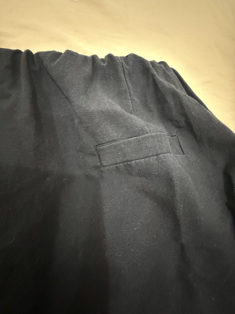 Black Elastic Waist Skirt with Pockets (Category: Skirts) located in Quezon City. Submitted by _cmls (Listing ID 1458438000, Image 3). Description: - Black skirt with elastic waistband - Relaxed fit, falls above the knee - Two functional side pockets - Faux pocket detail on the back - Linen-blend fabric for a comfortable feel - Ideal for casual outings -Bought from Thailand.