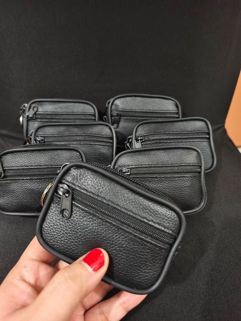 Black Leather Coin Pouch with Zipper and Keychain Loop (Category: Purses & Pouches) located in Santa Rosa. Submitted by gettinggorgeousph (Listing ID 1458433307, Image 2). Description: - Genuine black leather coin pouch - Secure zipper closure - Convenient keychain loop - Ideal for organizing small items like coins, keys, or earbuds - Simple, practical, and great for everyday use.
