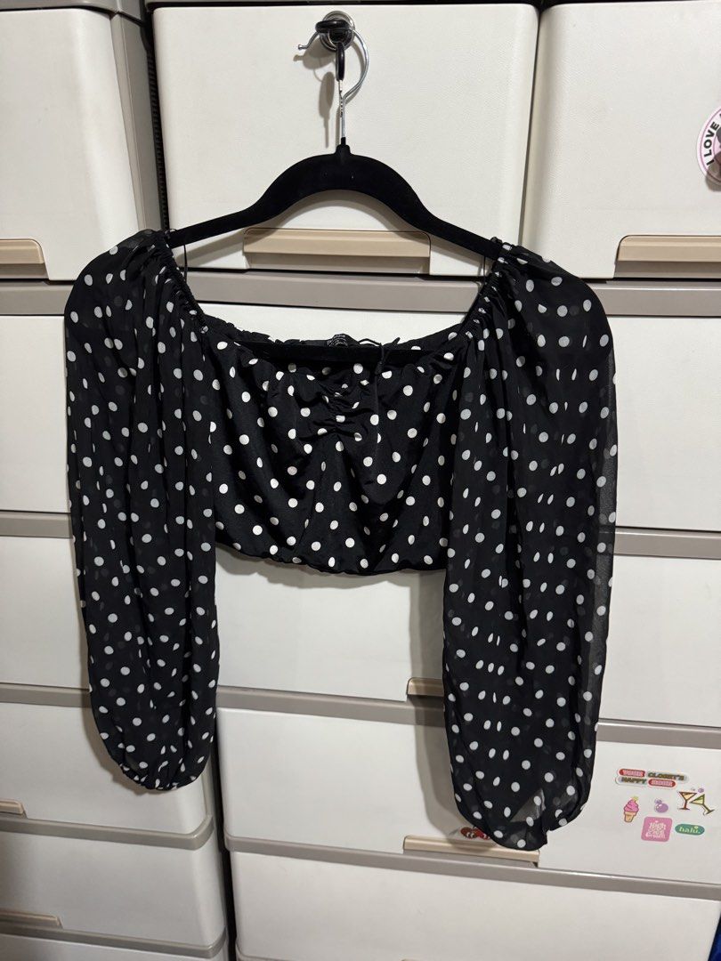 Black polka dot off-shoulder crop top (Category: Others Tops) located in Manila. Submitted by xiaoyu.jpg (Listing ID 1458470904, Image 3). Description: - Bershka black crop top with white polka dots - Off-shoulder design - Long puff sleeves - Ruched detail in the front - Lightweight and sheer material - Versatile for night outs or casual days.
