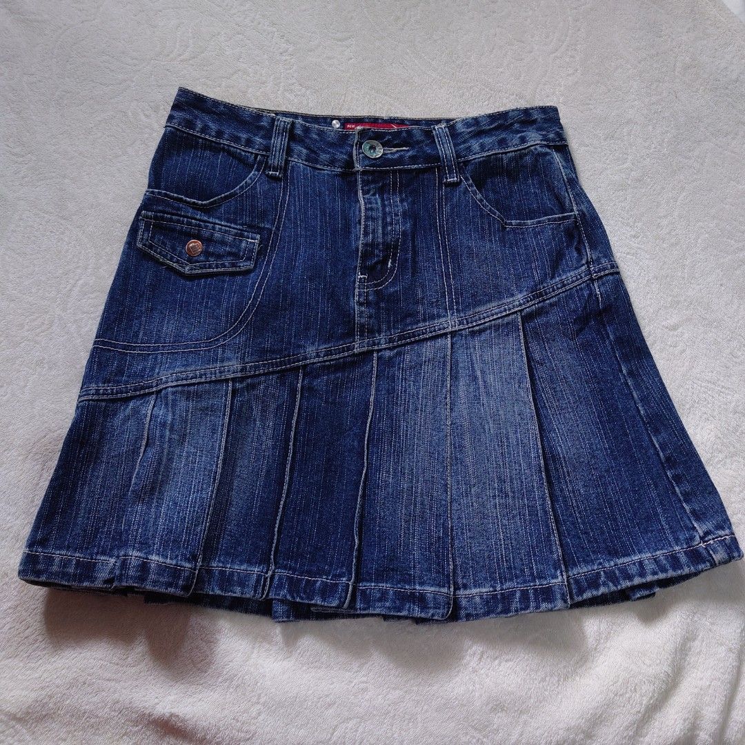 Blue Denim Pleated Mini Skirt (Category: Skirts) located in Diffun. Submitted by declutteredbyJill (Listing ID 1458310075, Image 1). Description: -waist 28 29, length 18 - Cute blue denim mini skirt - All-around pleated design - Functional front and back pockets - Secure button and zip closure - Ideal for casual wear and easy to style.