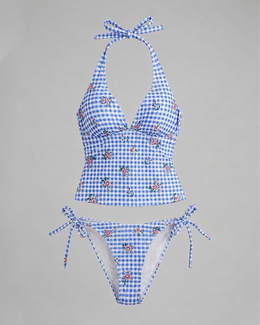 Blue Gingham Floral Halter Bikini Set (Category: Bikinis & Swimsuits) located in Manila. Submitted by shaeshops (Listing ID 1447262893, Image 1). Description: - Adorable blue gingham bikini with a charming floral print. - Features a flattering halter neck top with adjustable tie closure. - Matching bottoms with convenient tie sides for a customizable fit..
