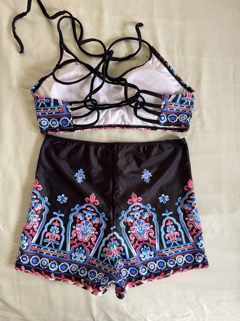 Boho Print High Neck Bikini Set with Shorts (Category: Bikinis & Swimsuits) located in Baguio. Submitted by makemegeli (Listing ID 1458324636, Image 2). Description: - Adorable boho print bikini set - High neck top with adjustable tie back - Matching high-waisted shorts - Ideal for beach or pool outings - Features fun colors and a unique pattern - Designed for a comfortable fit.