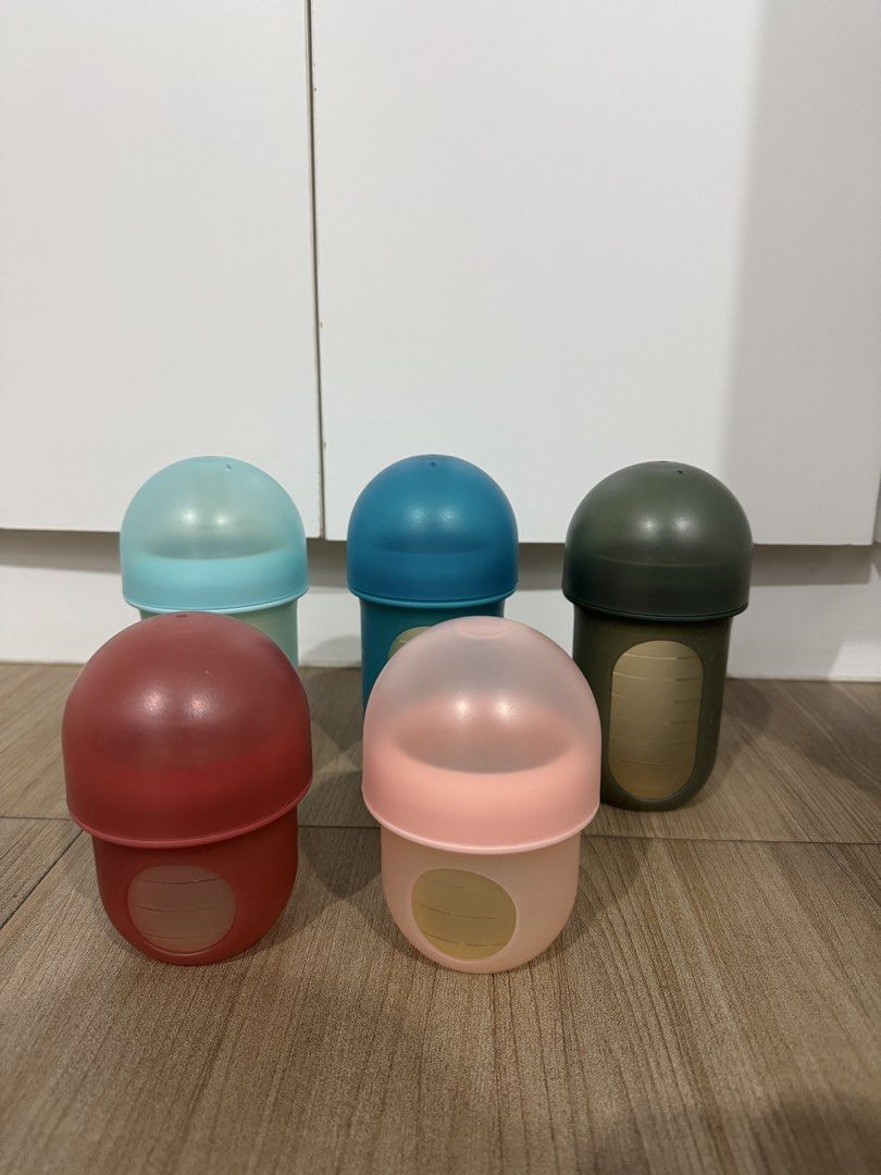 Boon Bottle Set (Category: Breastfeeding & Bottle Feeding) located in Quezon City. Submitted by heylouise (Listing ID 1458428868, Image 1). Description: - Set of 5 B.box mini snack containers - Cute acorn shape - Ideal for snacks on the go - Easy for little hands to open and close - Comes in assorted colors: red, pink, light blue, teal, and olive green - Great for lunchboxes or organizing small items.