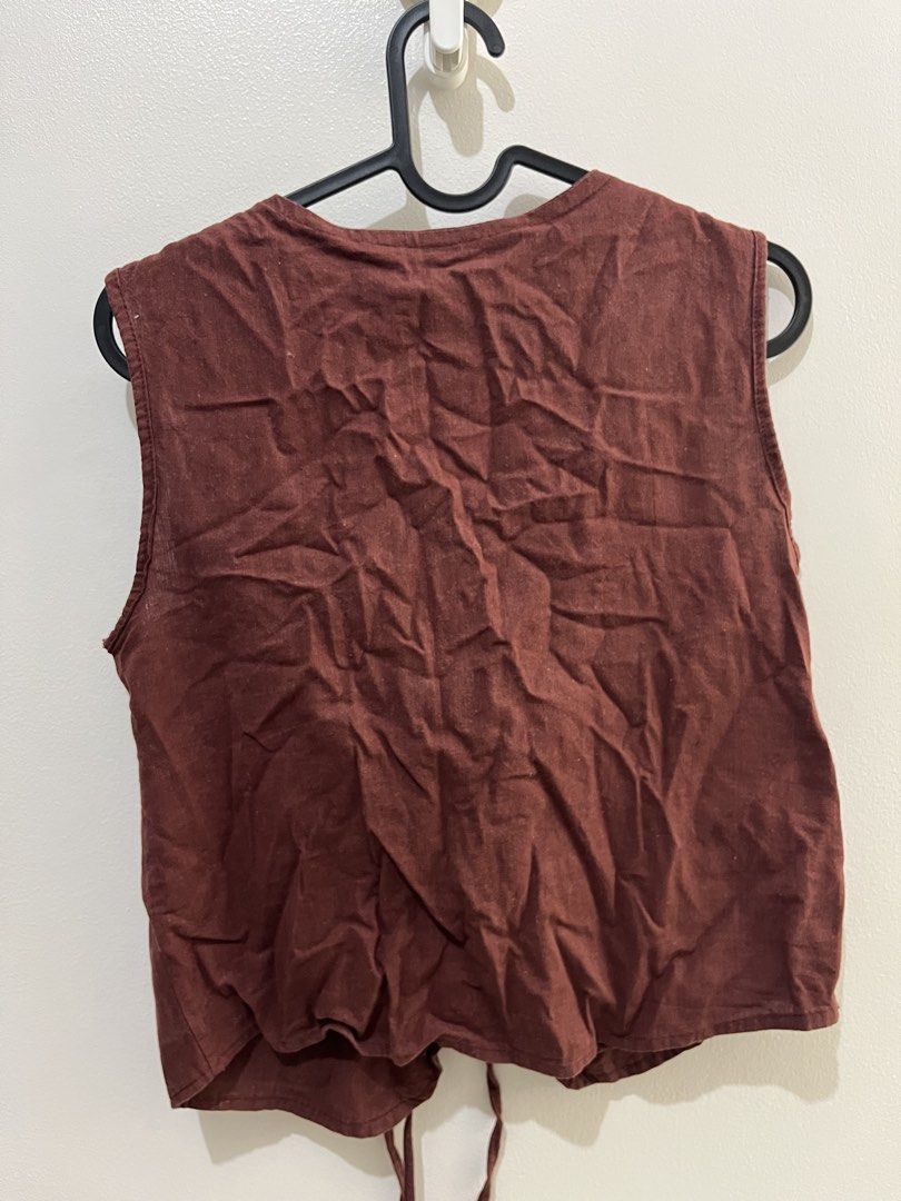 Brown Tie-Front Sleeveless Vest Top (Category: Sleeveless) located in Quezon City. Submitted by ycgomez (Listing ID 1458475319, Image 2). Description: Color may differ due to lighting :).
