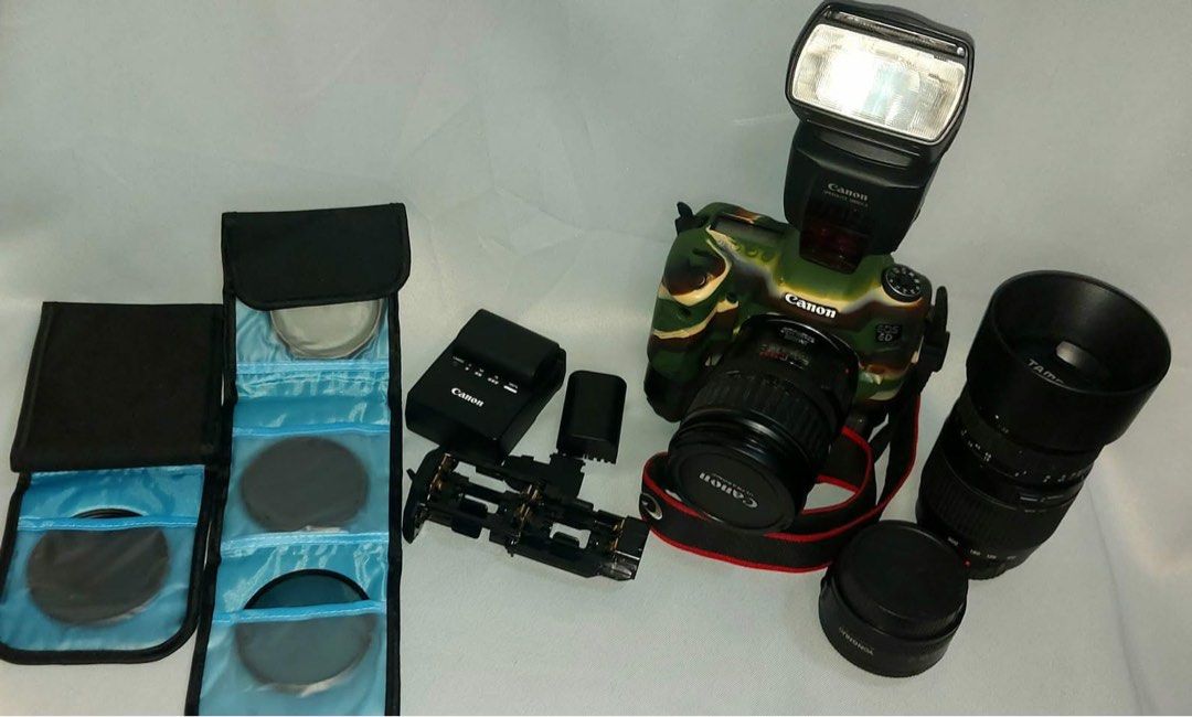 Canon 6D Full Frame with Lenses (Category: Cameras) located in Quezon City. Submitted by oddfox.8ed1ca (Listing ID 1458403455, Image 1). Description: Canon 6D super low Shitter Count , Only 16K shutter count , Original Japan made Canon Lens , Japan Made Canon Flash , 50mm lens , pack of lens filters , 4 pcs of heavy duty light stands , mic stand , film production light head sold As Pack , it is a package no item will be sold alone RFS : I have an