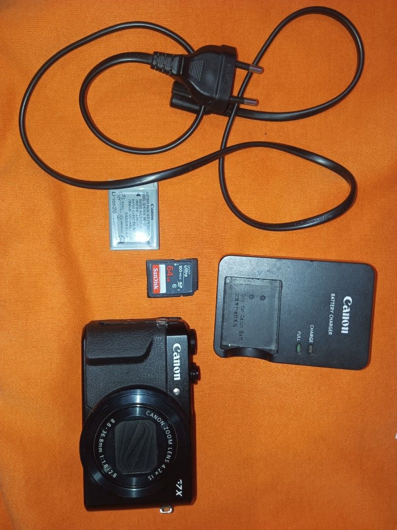 Canon G7x mark II (Category: Video Cameras) located in Manila. Submitted by zendog_1fac08 (Listing ID 1458325384, Image 2). Description: Canon G7x mark II No issue Good condition No dents No scratches all working buttons may kasama ng camera bag Sd Card Charger Battery Ready to use... Open for meet up pick up cash on deliveey....