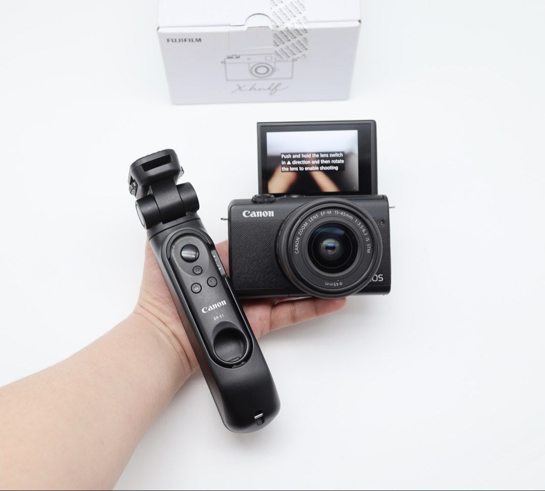 Canon M200 with tripod HG100TBR set (Category: Cameras) located in Manila. Submitted by jaimeeloutan (Listing ID 1458341179, Image 2). Description: for sale! M200 Mirrorless with canon 15-45 lens dupe for G7X Mark Ill brand new condition 💰32,490 only fixed price no more last price trending camera now with tripod HG100TBR worth 5,800 pesos Able to transform into a table-top tripod to hold you camera in place for self-recording or self-portraits -