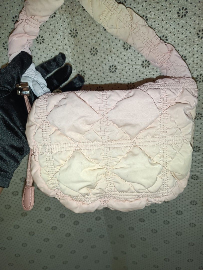 Carlyn Cotton Puff Small Sling Bag (Category: Cross-body Bags) located in Bolinao. Submitted by shayne_0215 (Listing ID 1458441896, Image 2). Description: - Cute pastel gradient adjustable Sling/Crossbody - Brand: Carlyn - Quilted with a soft puff texture - Zipper closure with a cute charm on the pull - Lined interior with a small pocket - Ideal for everyday use - Easy to carry and fits essentials Deal Now, Pay Now MOP: GCASH SF will be shouldere