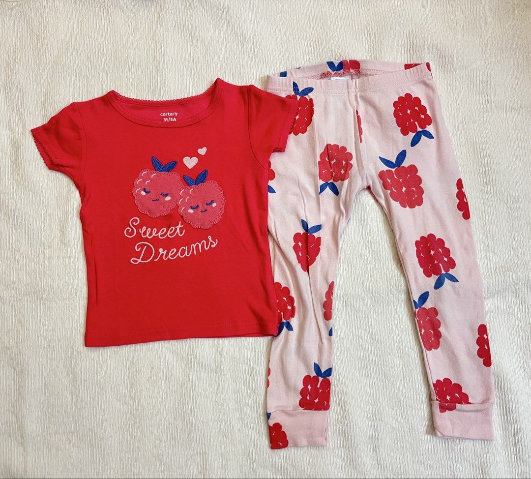 Carter's Red Raspberry "Sweet Dreams" Pajama Set Size 3T (Category: Babies & Kids Fashion) located in Quezon City. Submitted by muffet9 (Listing ID 1458324948, Image 1). Description: - Carter's pajama set, size 3T - Red short-sleeve top with embroidered raspberries and "Sweet Dreams" text - Matching pink leggings with all-over raspberry print - Comfortable and cute for bedtime -has some flaws on the embroidery of shirt -fabric is still very soft 