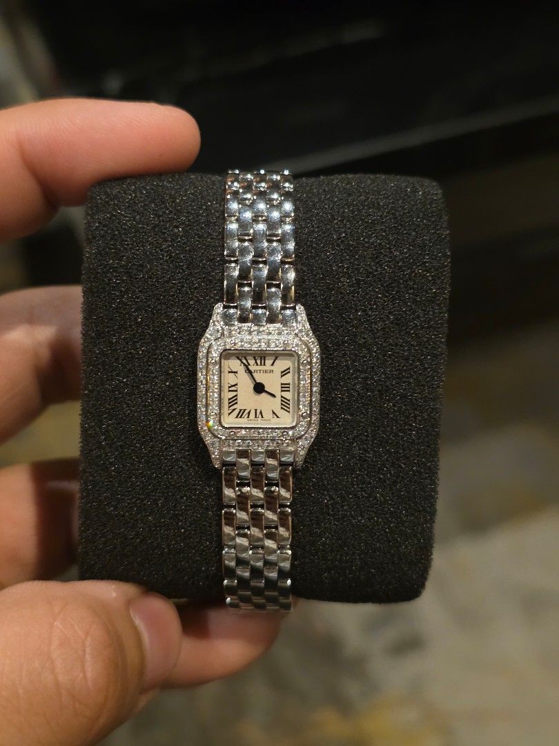 Cartier Panthere Mini (Category: Luxury Watches) located in Manila. Submitted by szecarl10168890 (Listing ID 1458418296, Image 1). Description: - Cartier Panthere Watch - Small Size - Diamond Bezel - Roman Numeral Dial - Stainless Steel Band - Complete Set (Box and Papers) - 2003 Model.