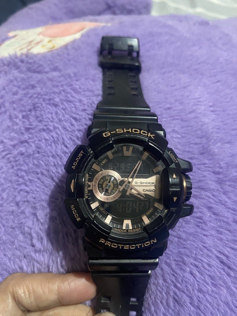 Casio G-Shock Black Rose Gold Watch (Category: Men's Watches) located in Manila. Submitted by rjsaniramsad4394 (Listing ID 1458381097, Image 2). Description: - Black G-Shock watch - Rose gold accents - Digital and analog display - Shock resistant - Antimagnetic - Ideal for everyday wear - Selling as is.