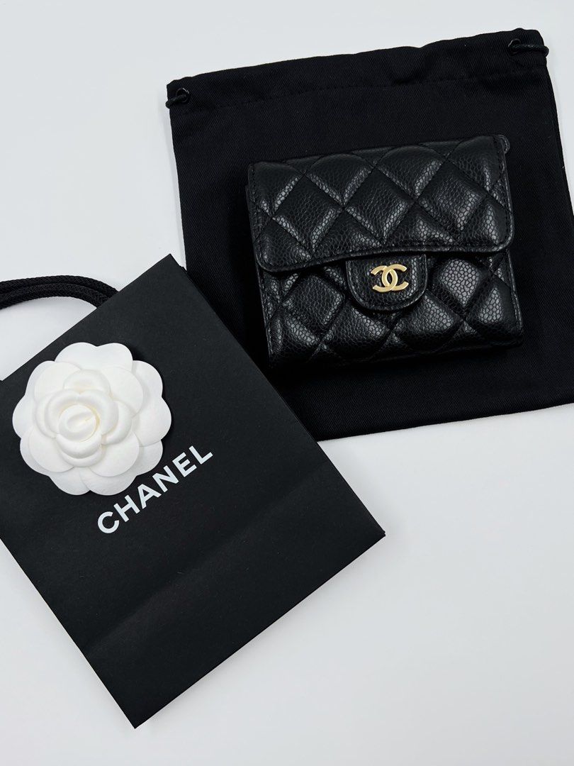 ▪️Chanel trifold black wallet (Category: Luxury Bags & Wallets) located in Makati City. Submitted by aveltot_rig (Listing ID 1458340306, Image 1). Description: Item: Chanel trifold, rare and hard to get series 31 holo intact Size: One size Condition: Like New! ✨ *Paperbag and dustbag 🎌HK box sourced. No certificate or warranty. Not for resale!.