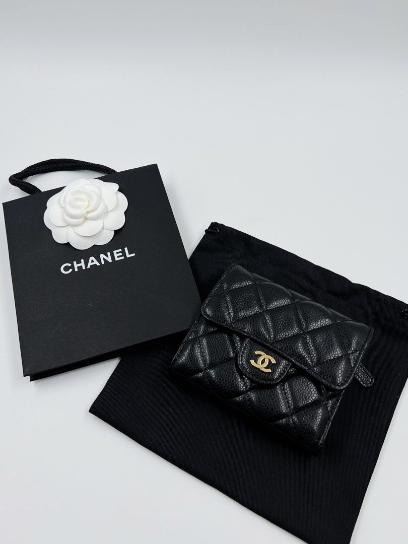 ▪️Chanel trifold black wallet (Category: Luxury Bags & Wallets) located in Makati City. Submitted by aveltot_rig (Listing ID 1458340306, Image 2). Description: Item: Chanel trifold, rare and hard to get series 31 holo intact Size: One size Condition: Like New! ✨ *Paperbag and dustbag 🎌HK box sourced. No certificate or warranty. Not for resale!.