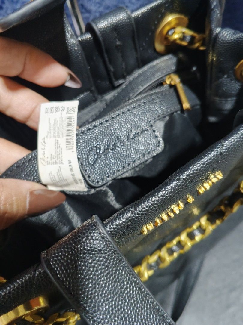 Charles & Keith Black Quilted Leather Handbag (Category: Luxury Bags & Wallets) located in Bulacan. Submitted by dn_thrifted (Listing ID 1458388443, Image 3). Description: - Authentic Black 3 way CHARLES & KEITH TOTE / Handbag - Quilted Leather with CHARLES AND KIT LOGO - Top Handle and Detachable Shoulder Strap - Medium Size - Versatile for Daily Use or Nights Out - Clean Interior.