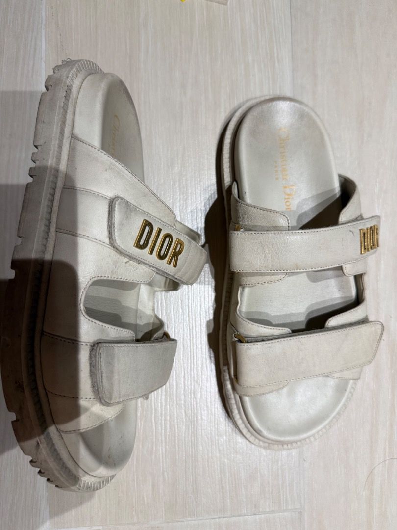 Christian Dior Leather Sandals Size 38 (Category: Flats & Sandals) located in Quezon City. Submitted by ilabluxe (Listing ID 1458391825, Image 1). Description: - Authentic white leather Dior sandals - Features iconic DIOR logo - Size: 38 Note this is used and you are not buying a brand new 100% Authentic or money back guarantee 100 % Authentic or Money Back Guarantee - with Dior Dust Bag.